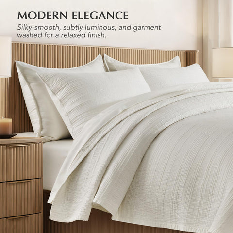 Evergracehome oversized king quilt drapes elegantly across the bed.