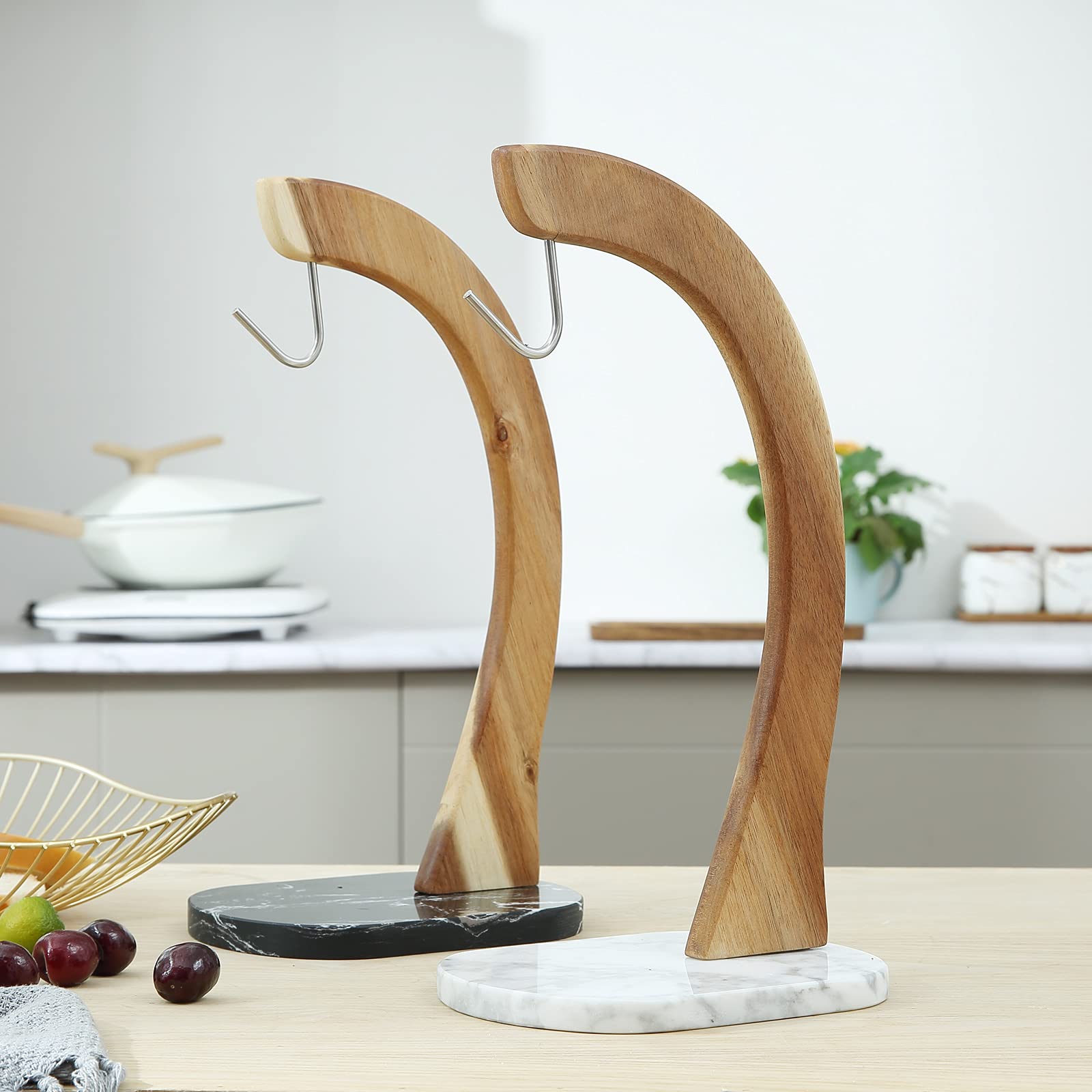 Everous banana holder tree demonstrates space-saving storage for fresh produce on countertops.