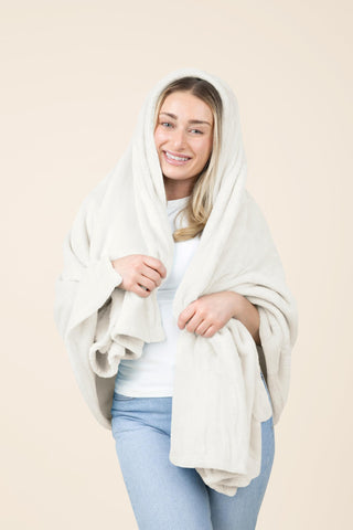 EverSnug travel blanket used as a pillow for comfortable rest
