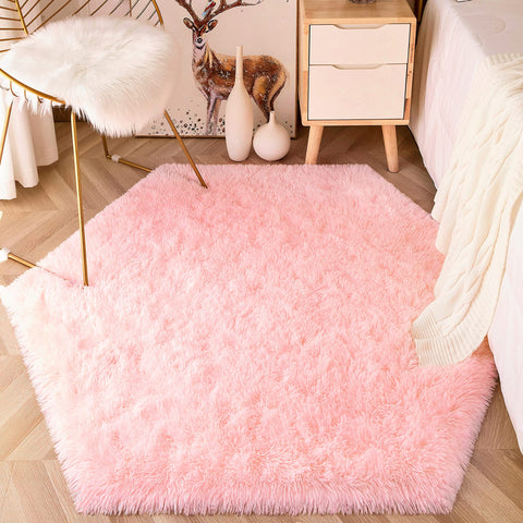 EVOIONOS pink hexagon rug creates a warm play area on the floor