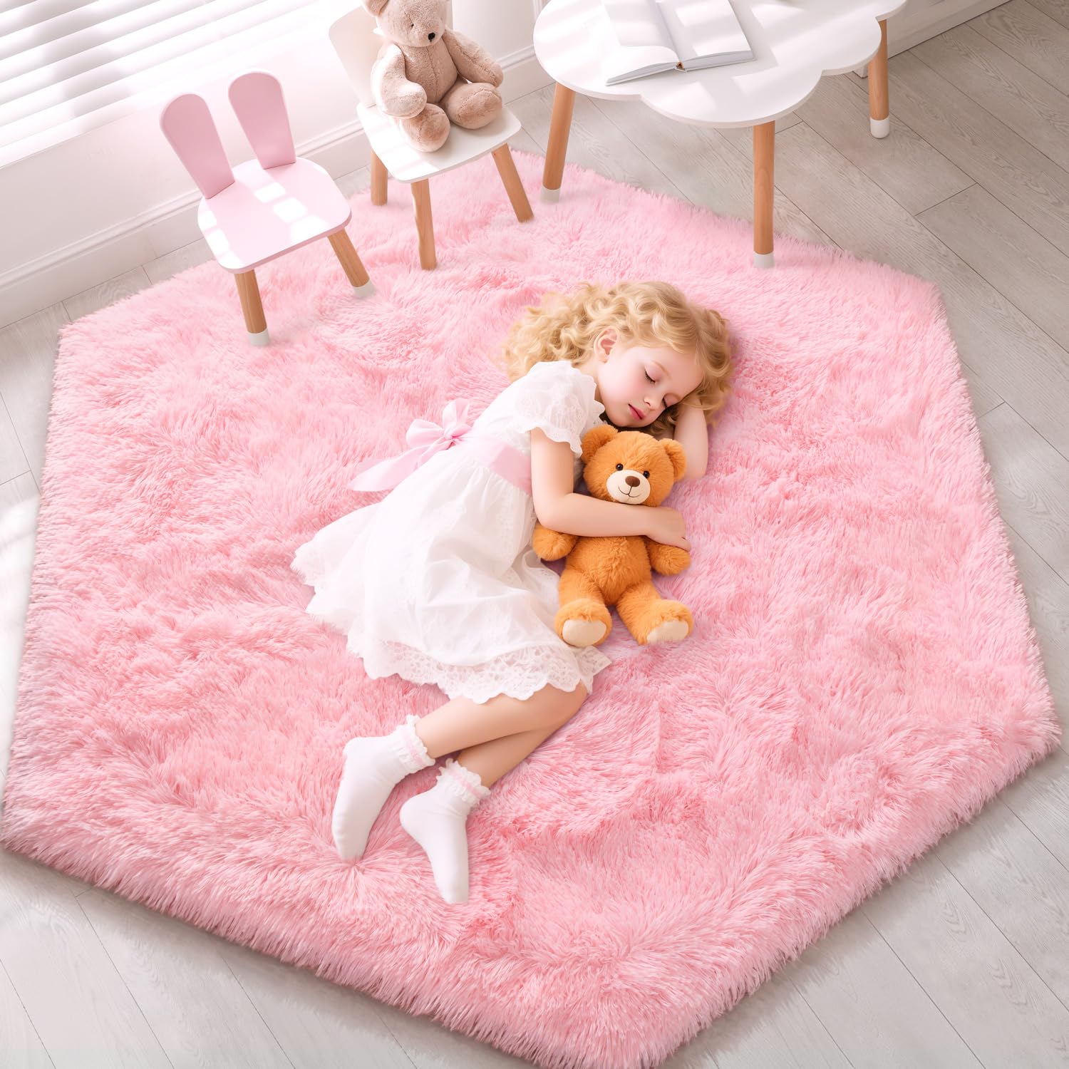 EVOIONOS pink hexagon rug in princess tent offering plush comfort for pretend play