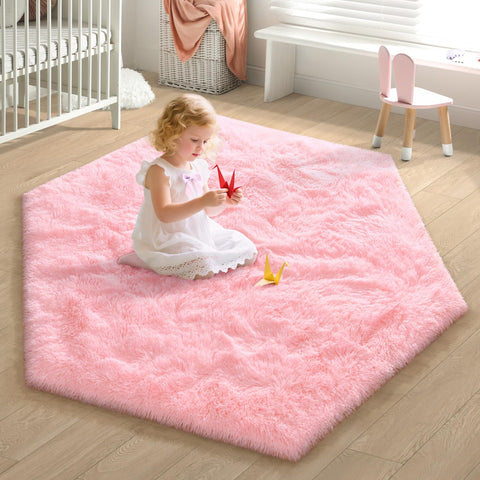 EVOIONOS pink hexagon rug shows plush pile for feet comfort