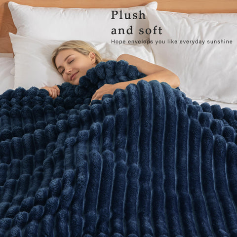 Exclusivo Mezcla striped jacquard design blanket adds elegant texture to bed or couch