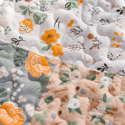Exclusivo Mezcla reversible camel throw adds two styling options