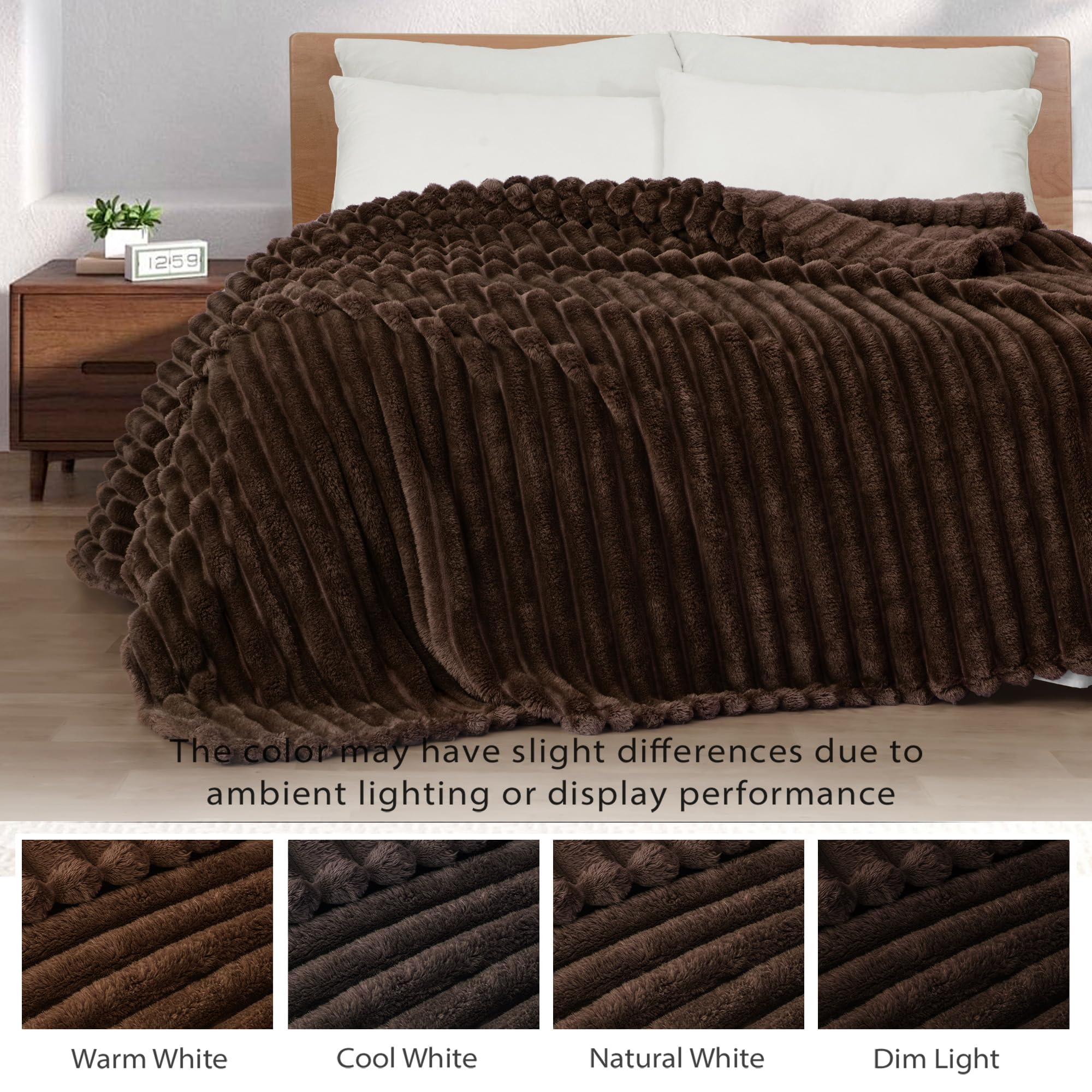 Exclusivo Mezcla twin-size blanket draped as a cozy bed spread