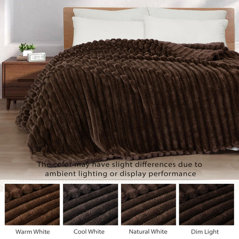 Exclusivo Mezcla twin-size blanket draped as a cozy bed spread