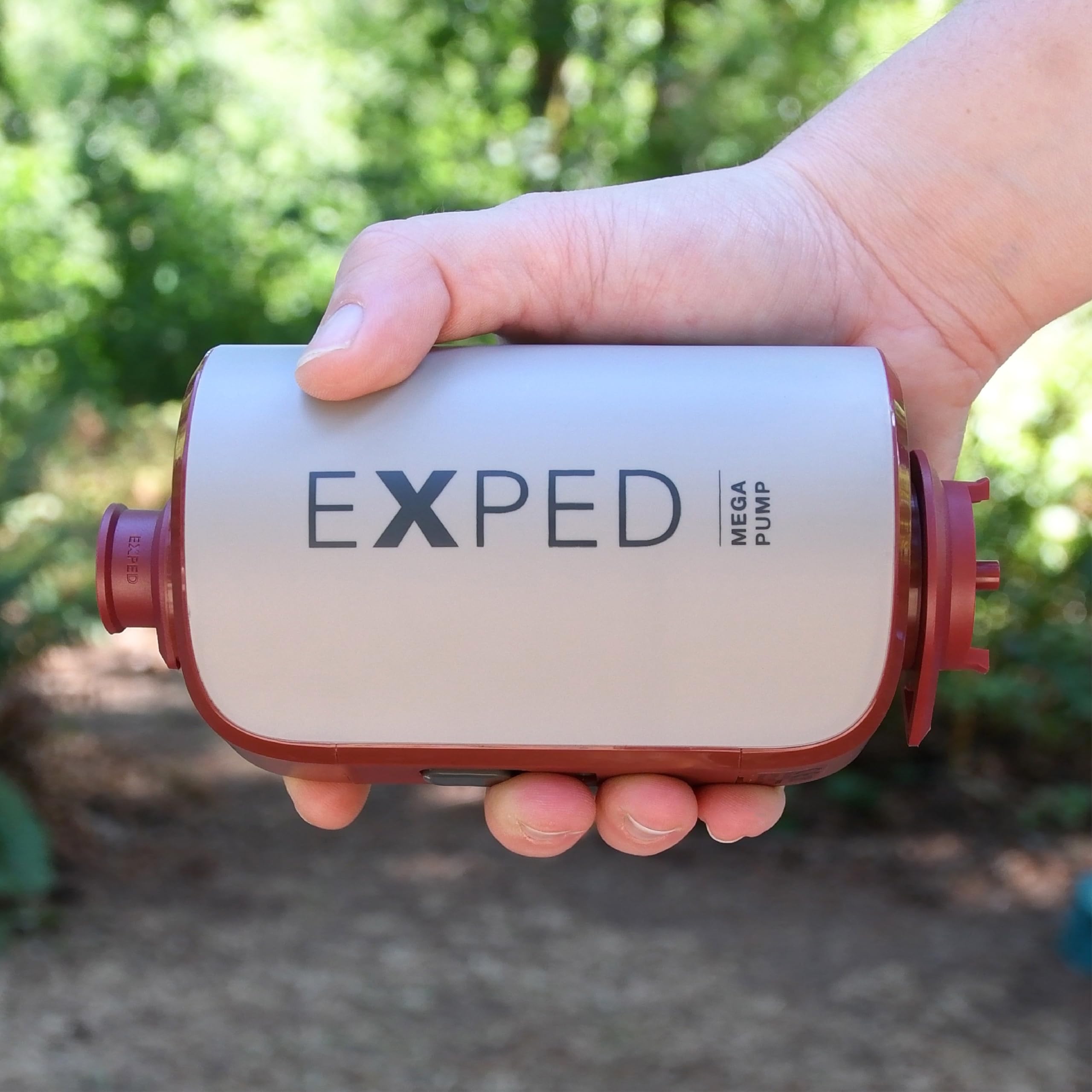 Compact Exped Mega Pump fits in a pack for easy travel.