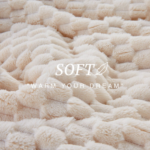 Blanket placed on bed provides cozy all-season comfort.