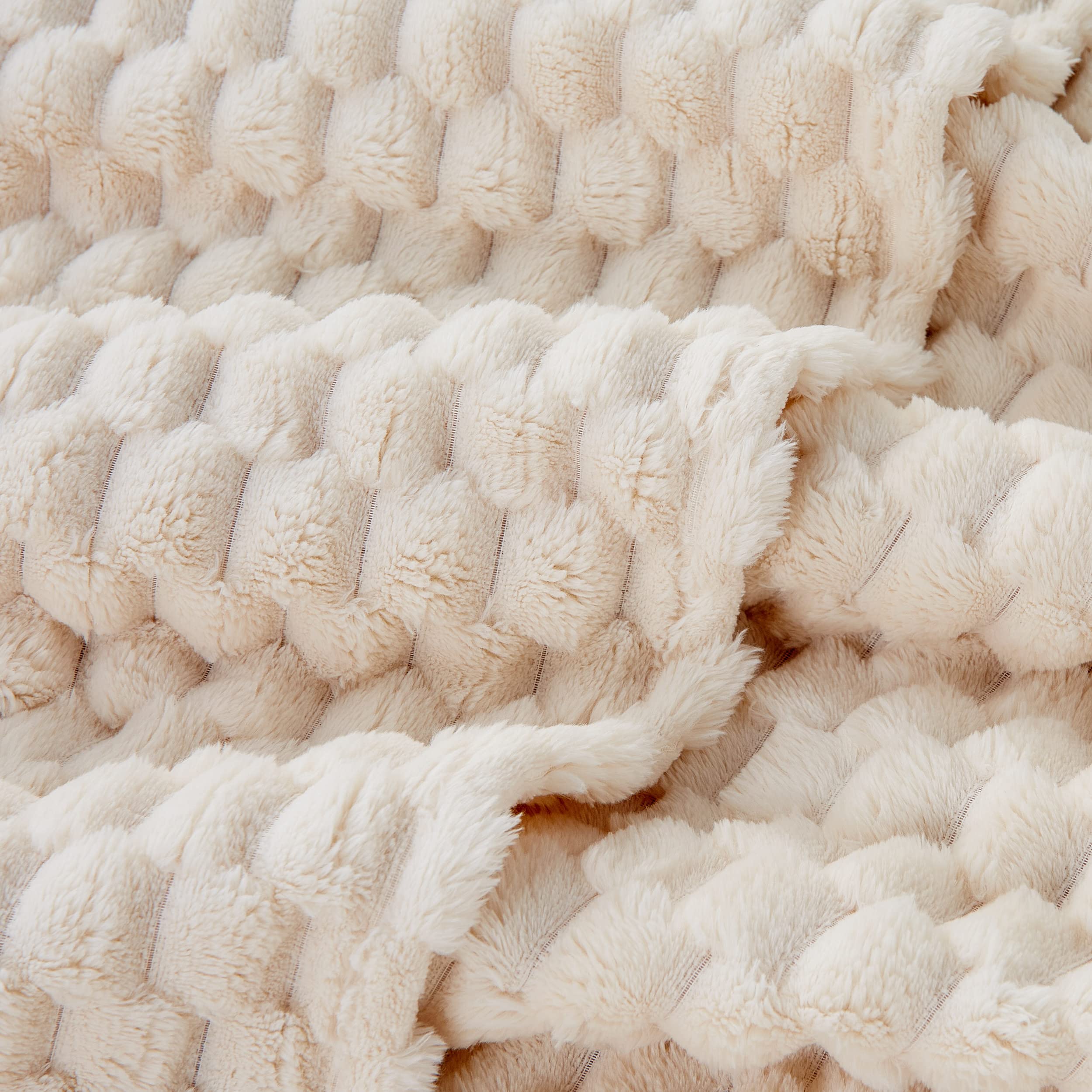 Draped on the couch for warmth and texture.