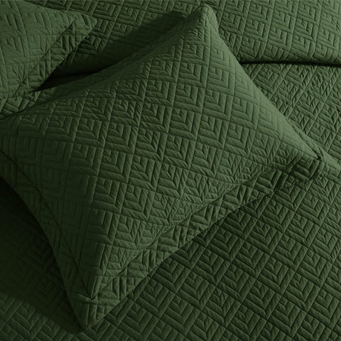 EXQ Home olive green quilt set in a bedroom scene for versatile all-season decor