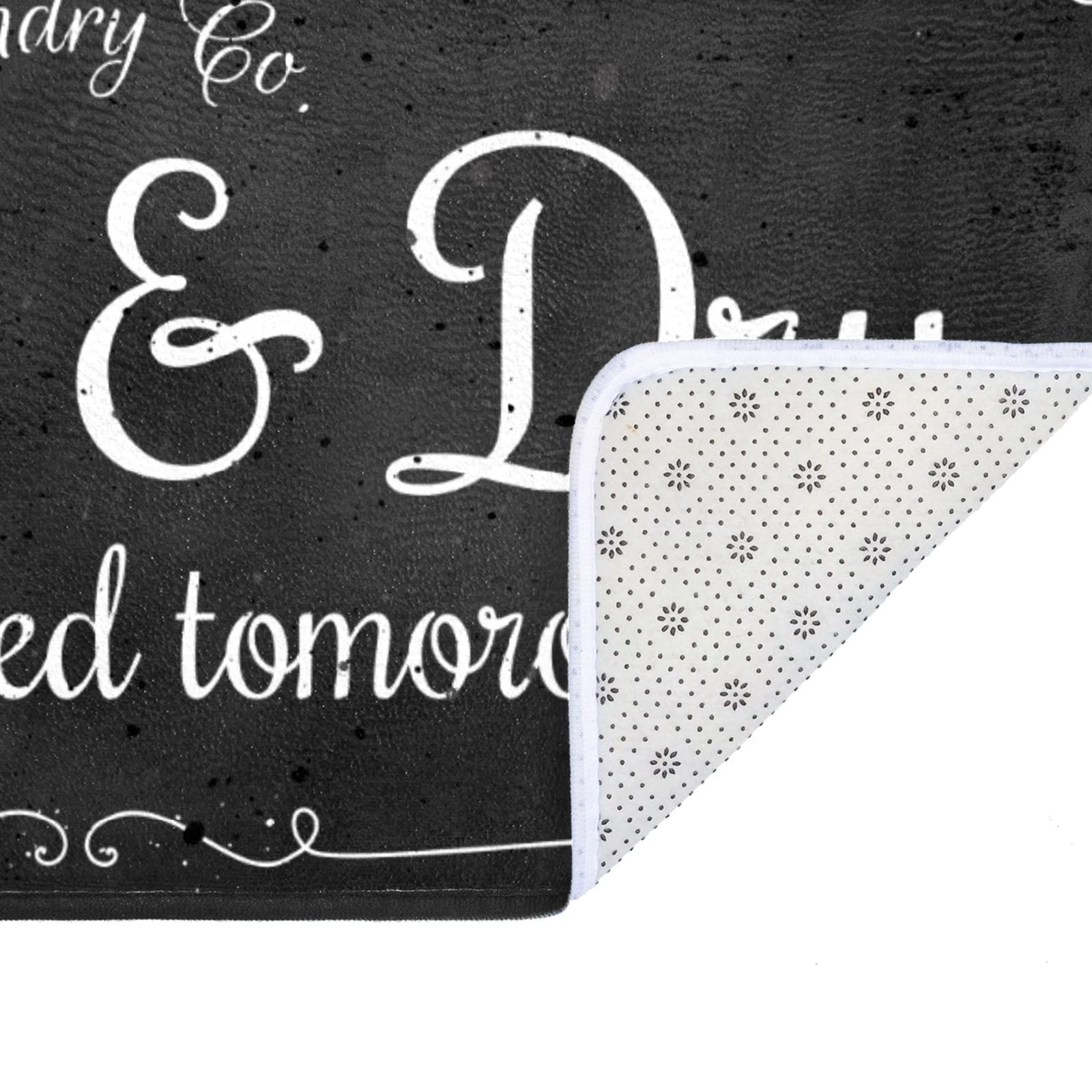 EYECY black farmhouse-style rug complements laundry or entryways.