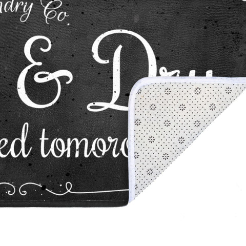 EYECY black farmhouse-style rug complements laundry or entryways.