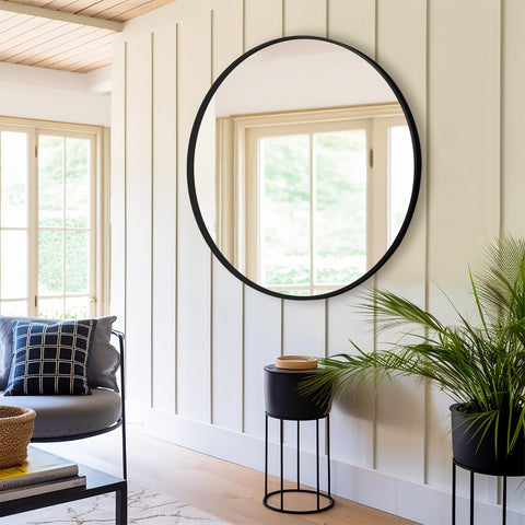 Fabuday living room round mirror reflection capturing natural light and making space look larger