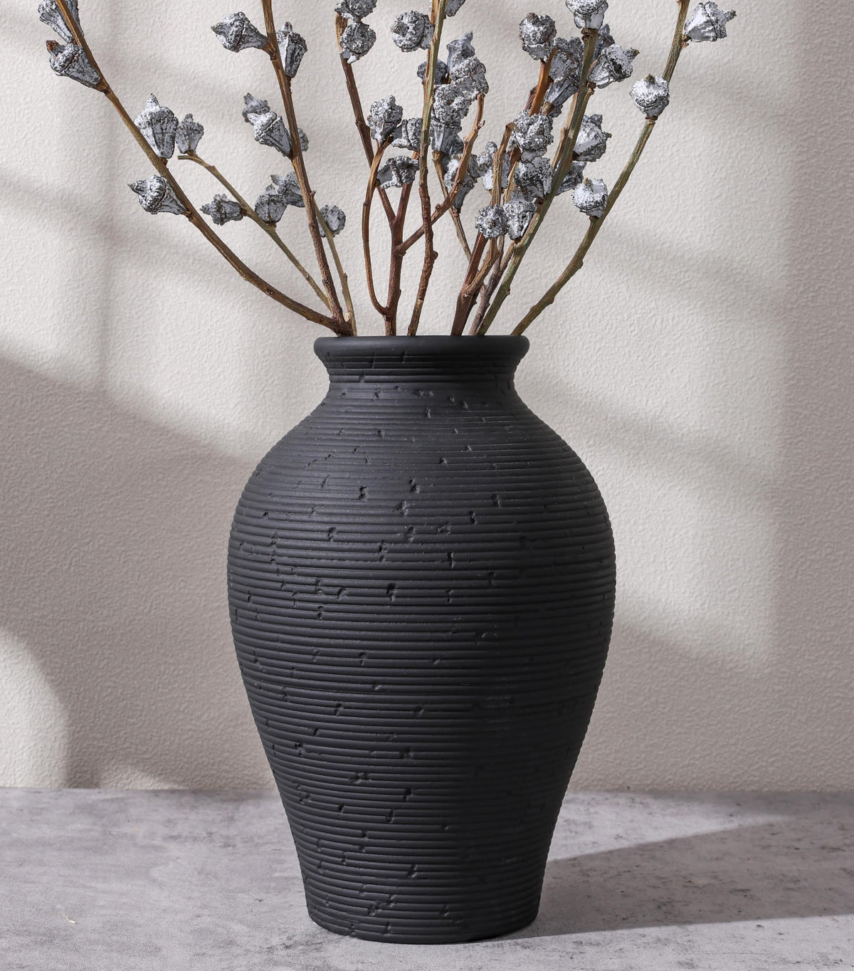 FancyPlus ceramic vase 9in ideal centerpiece for any room.