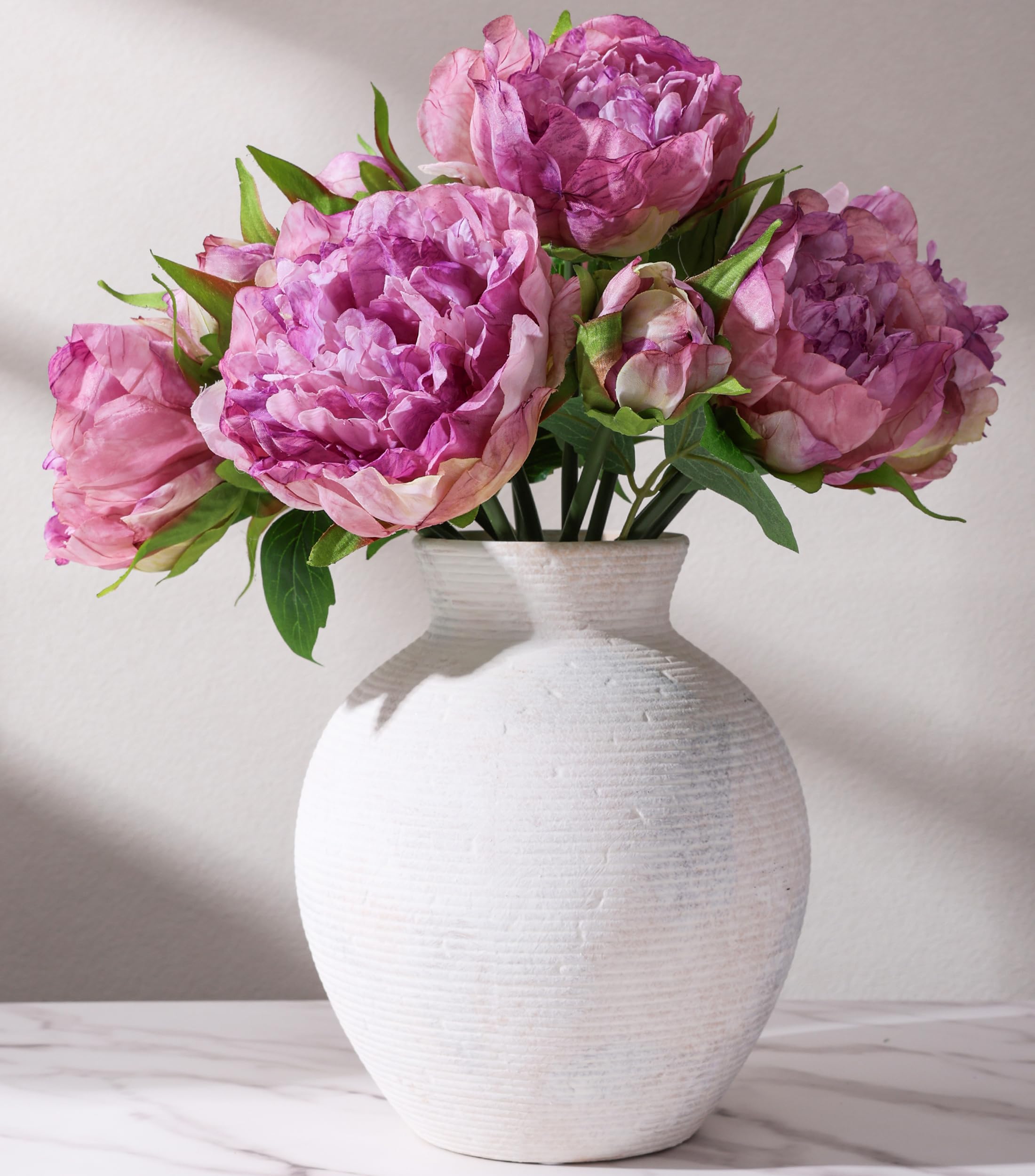FancyPlus ceramic flower vase with rustic matte finish, ideal for centerpiece displays.