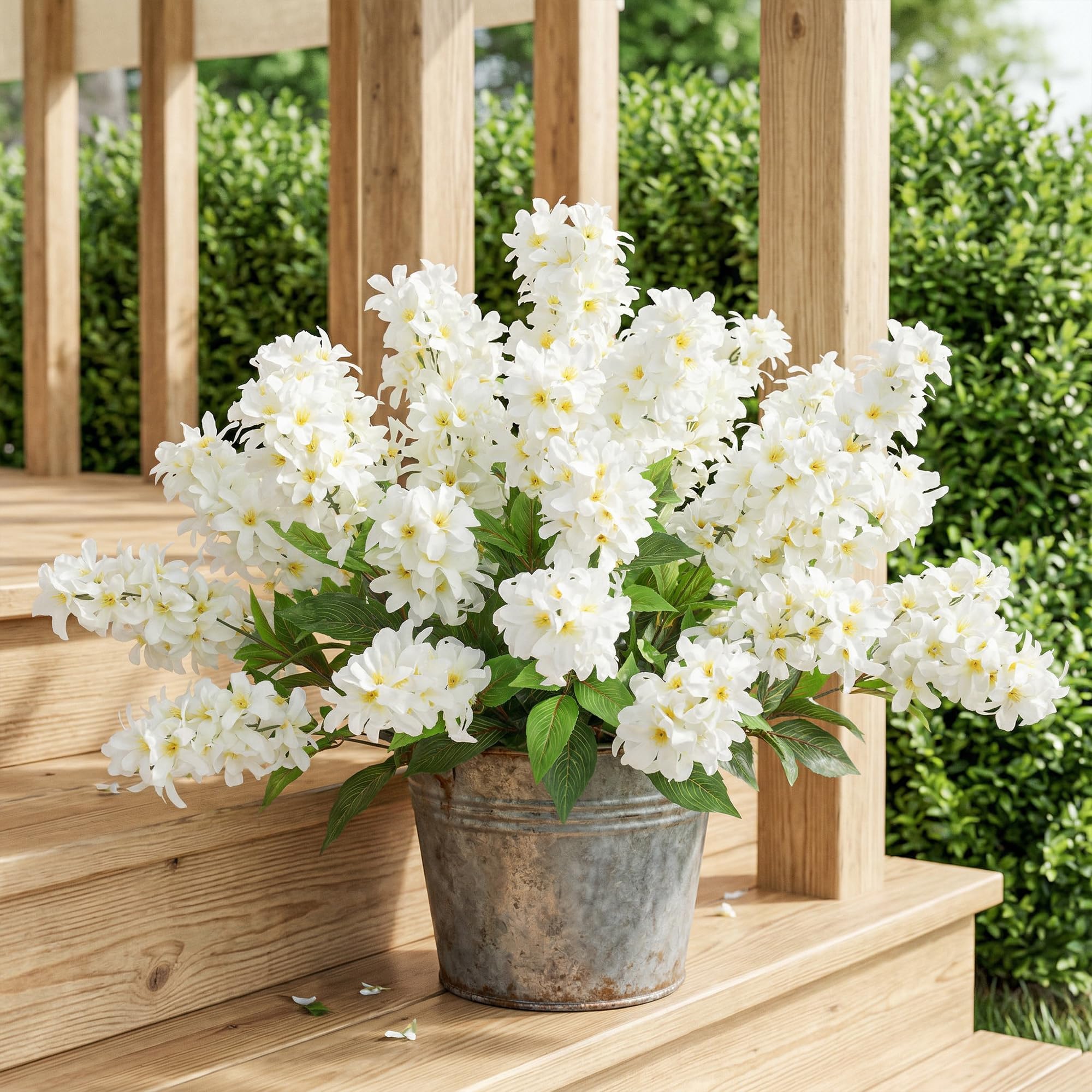FancyPlus outdoor silk flowers enhance porches and living spaces.