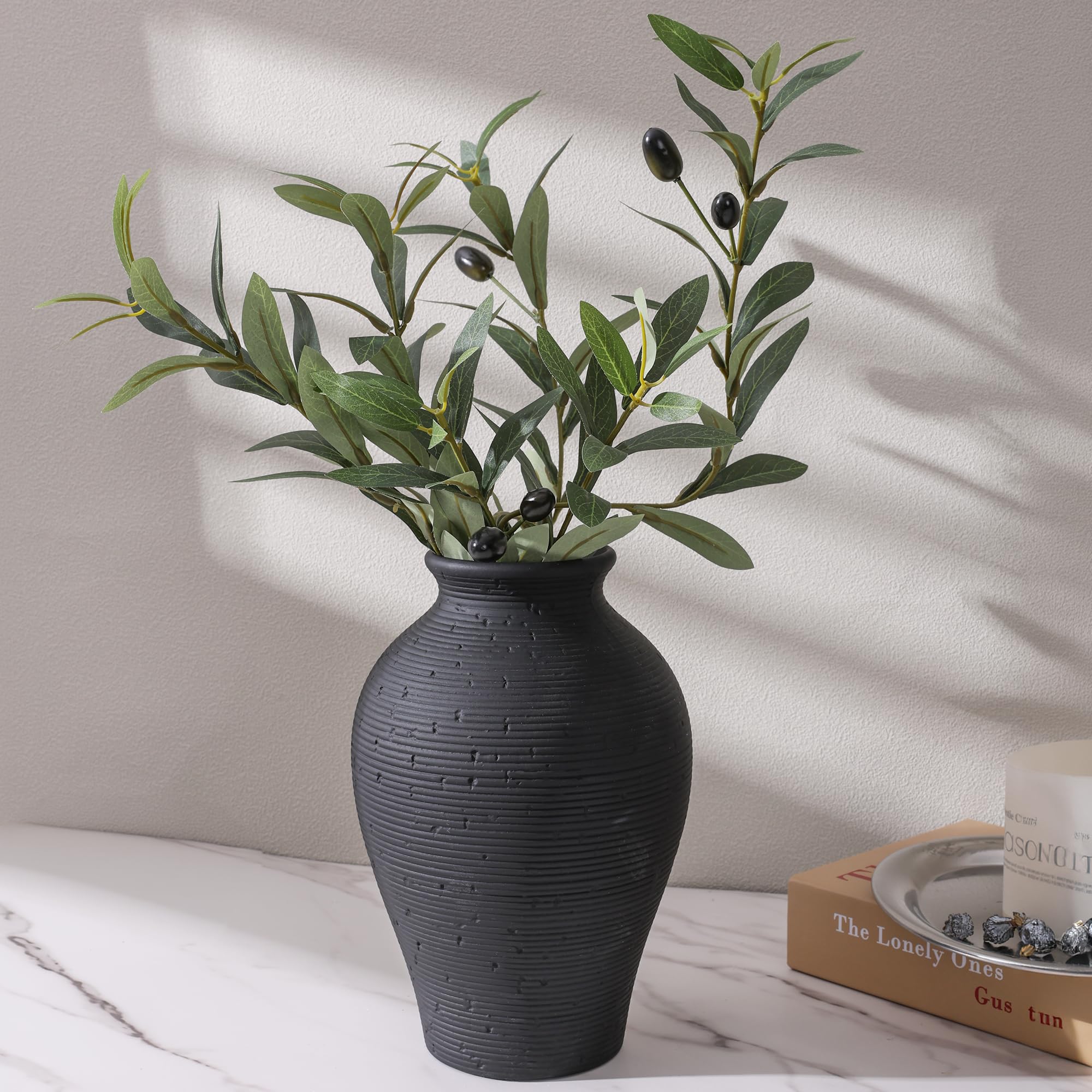 FancyPlus vase with fresh flowers demonstrates waterproof design for real water.