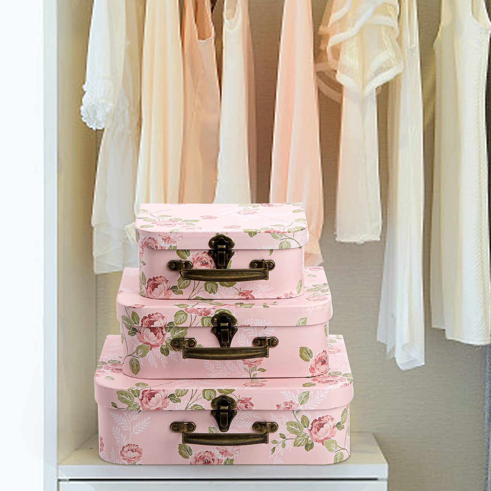 Fasmov leatherette handle detail on pink suitcase box for easy carrying