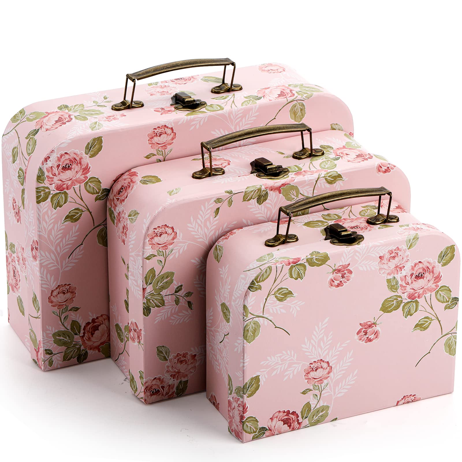 Fasmov lid with brass fixtures on a pink suitcase box for elegant gift presentation
