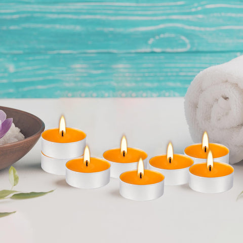 Fclayvts tealights on dining table enhance mood and decor.