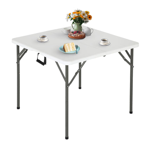 FDW 34-inch folding card table with white top, ideal for parties and backyard meals.