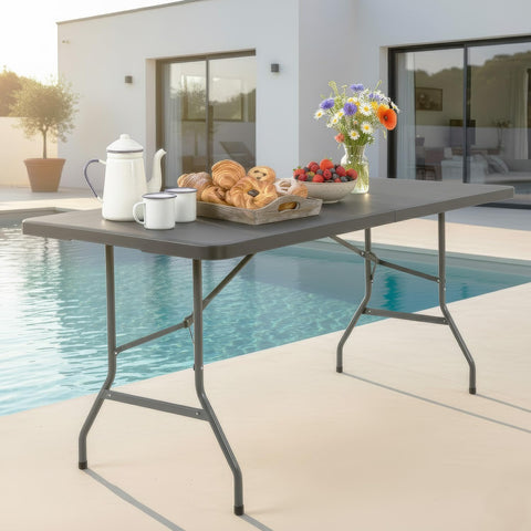 FDW 6ft folding table folded compact storage in small spaces.