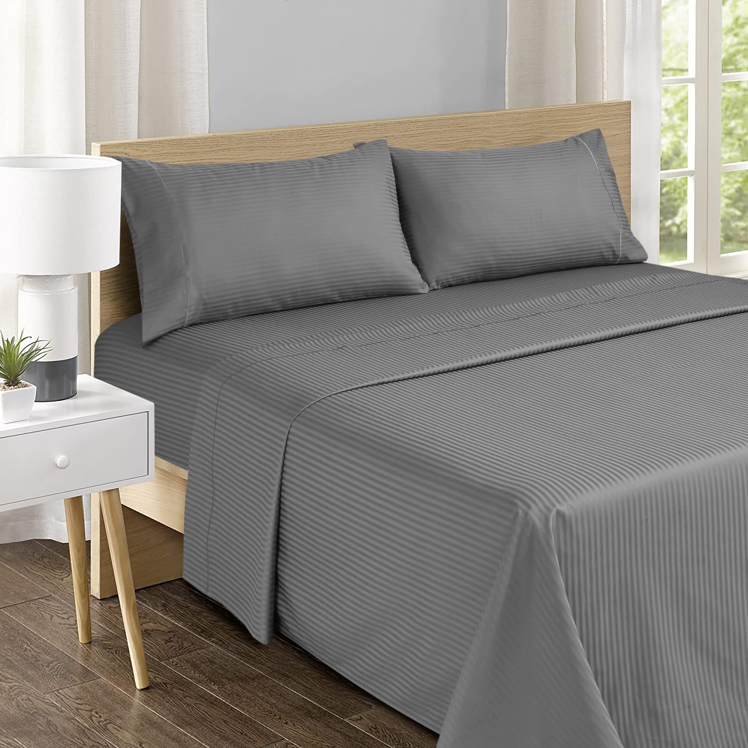 Feather & Stitch New York sateen finish fabric shows silky breathable texture