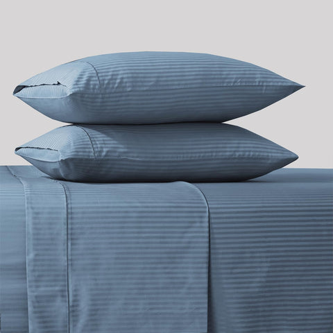 Feather and Stitch New York queen damask bedsheet set flat view with blue stripe.