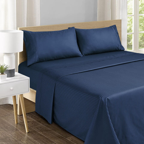 Feather & Stitch New York dark blue striped design — stylish, versatile bedroom accent.