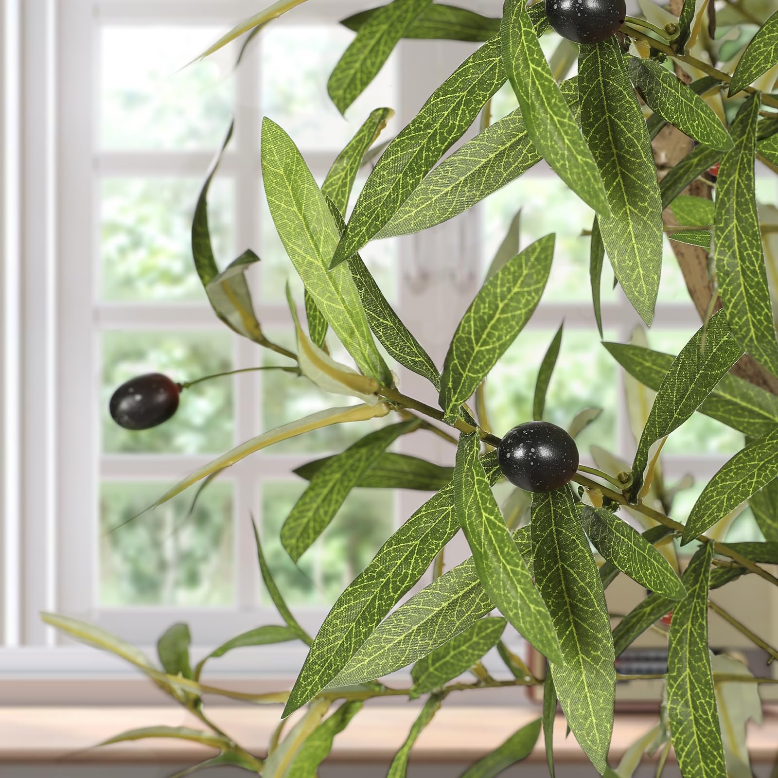 FEELEAD olive tree with fruit detailing adds natural color to spaces.
