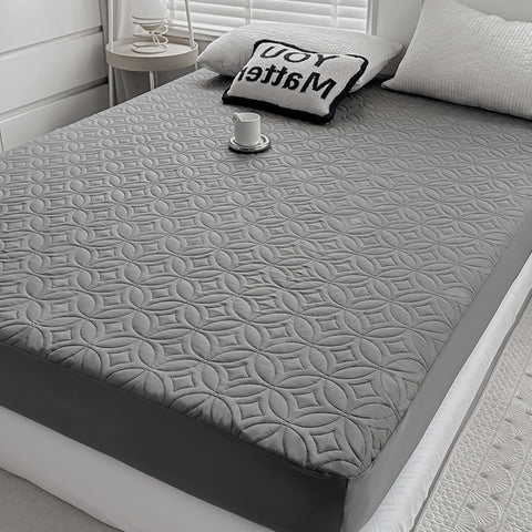 FELTYBED full-size waterproof mattress protector guarding a 54x75 bed against spills