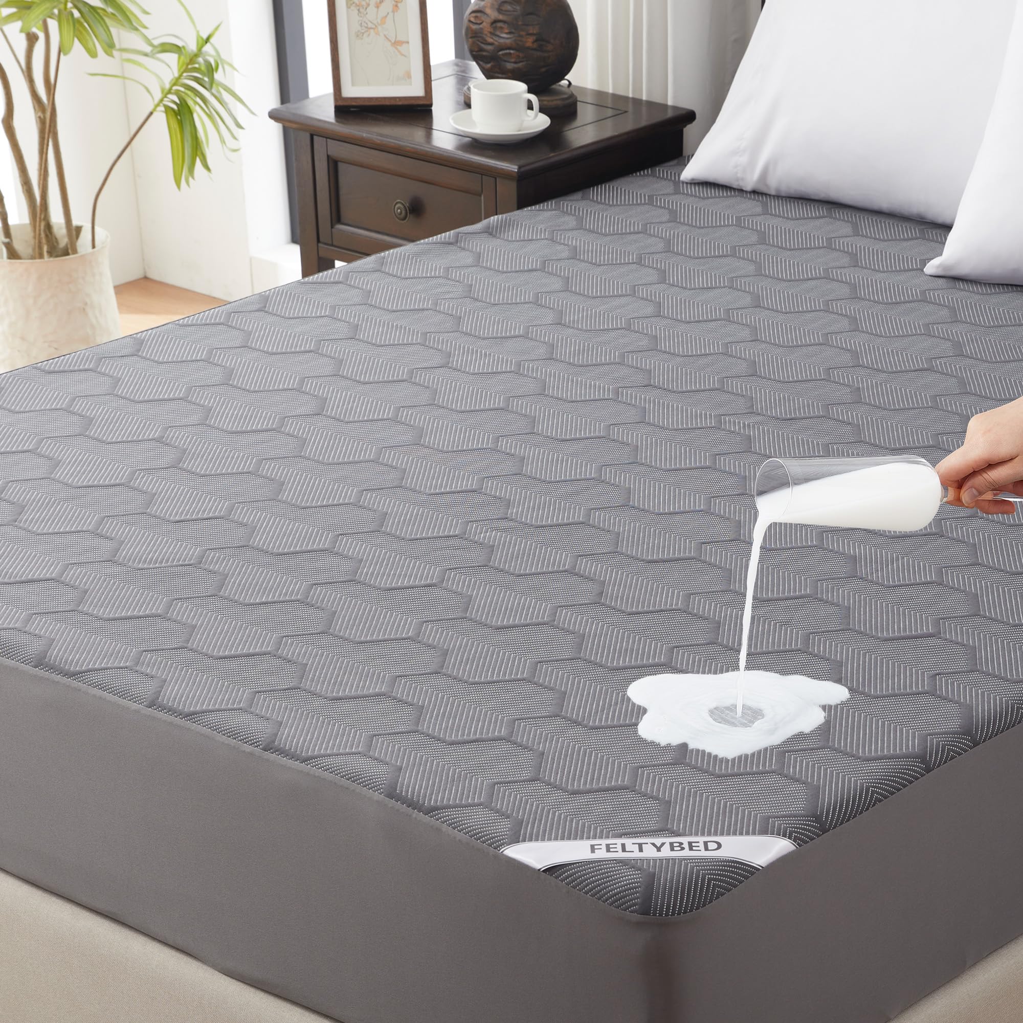Feltybed waterproof mattress protector cover close-up showing breathable, spill-blocking layer
