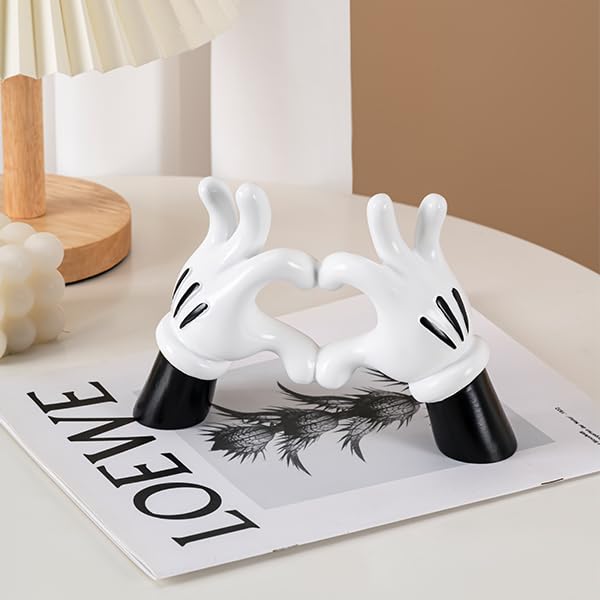 FelyHos desk decoration heart hand sculpture brightens your workspace with cheerful vibes.