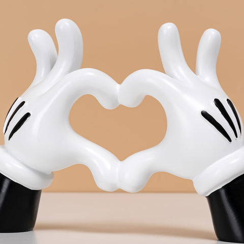 FelyHos modern home decor accent brings whimsical heart gesture to any room.