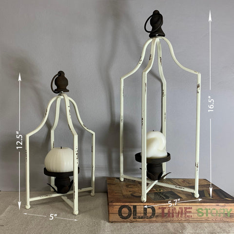 Fenisam lanterns as wedding or holiday centerpiece with greenery