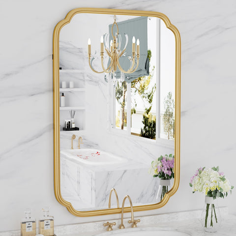 Ferytange gold bathroom mirror 20x30 reflecting light to brighten the vanity.