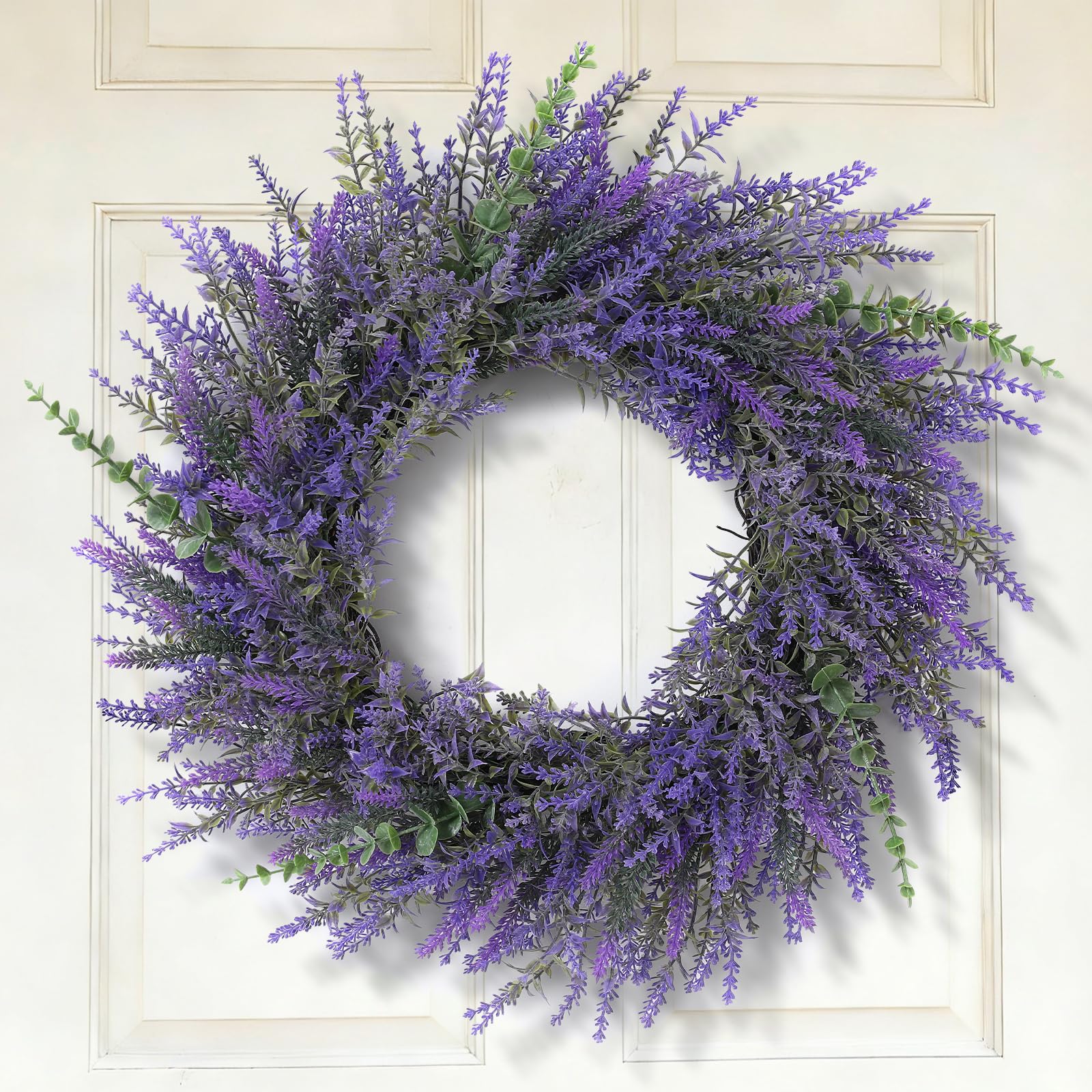 FestalMart 26-inch lavender-eucalyptus wreath on front door enhances curb appeal and seasonal charm.