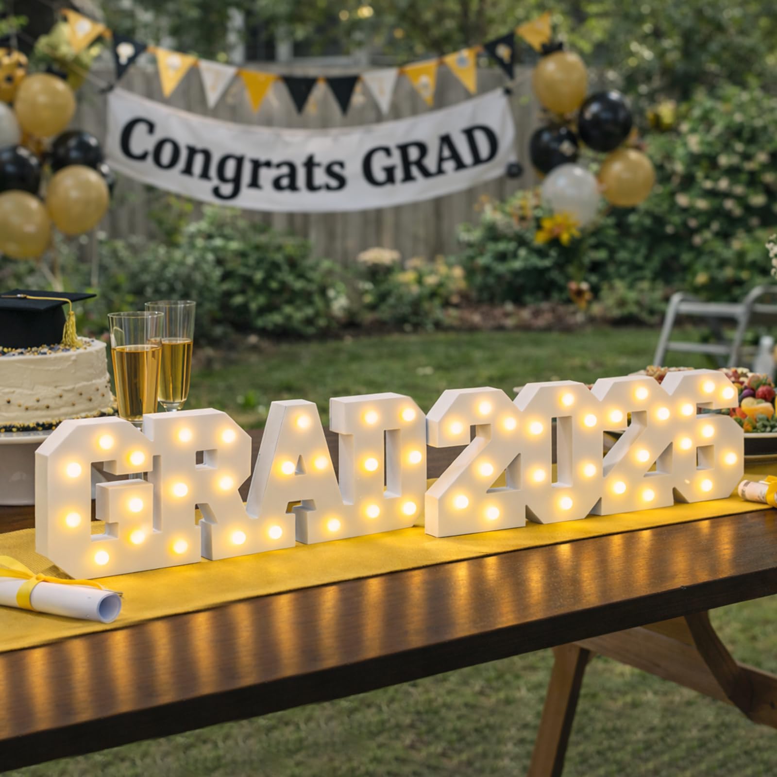 FestalMart Grad 2026 glow on dessert table, draws guest attention gently.