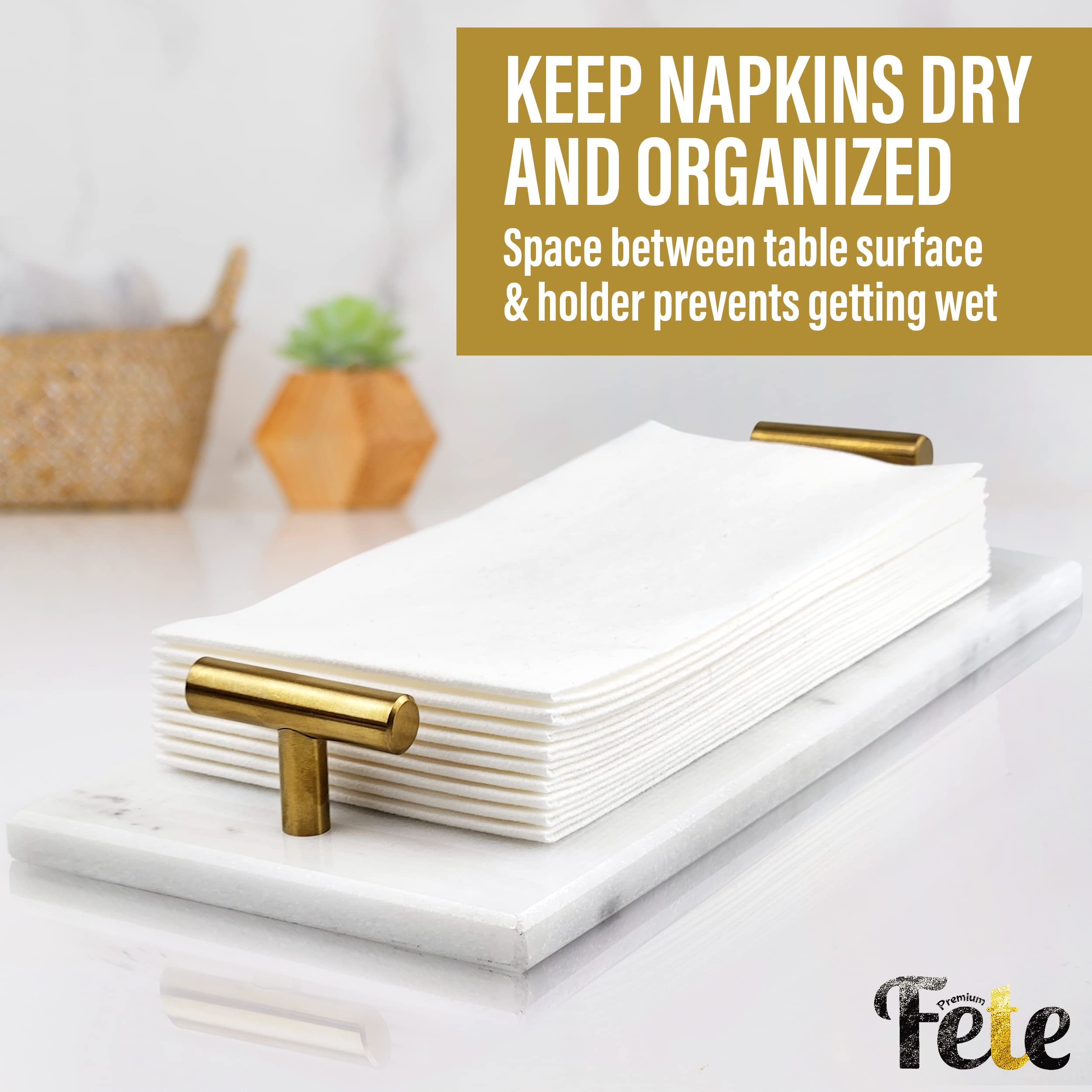 Fete bathroom napkin holder on counter keeps disposable towels neatly within reach.