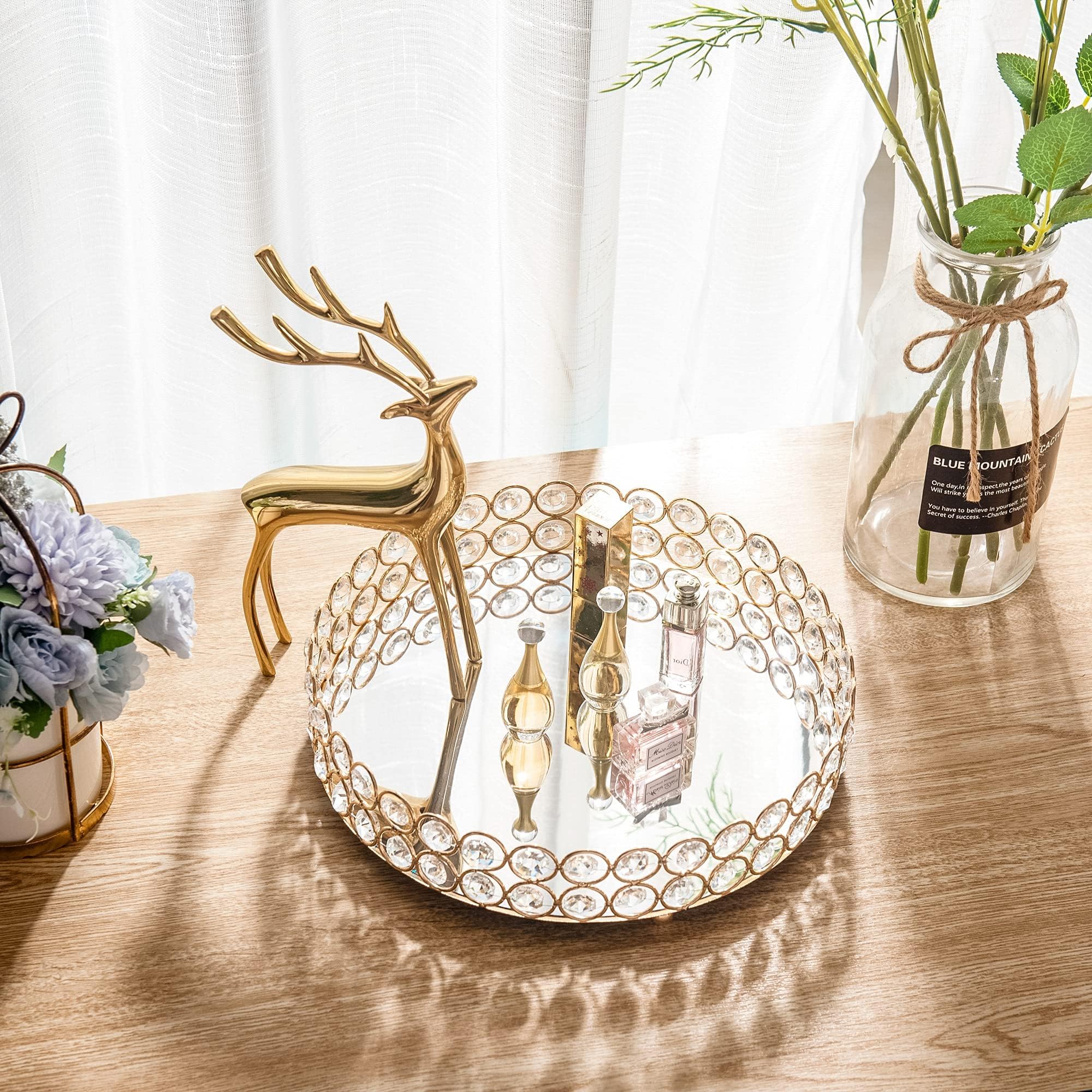 Feyarl jewelry and trinket display on gold-toned tray