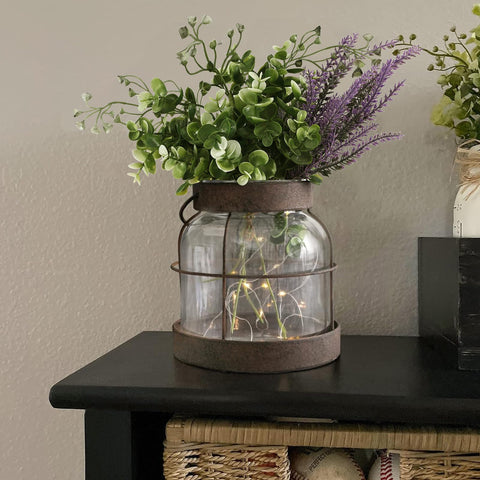 FIAHOSEY rustic lantern vase doubles as candle holder for intimate occasions.