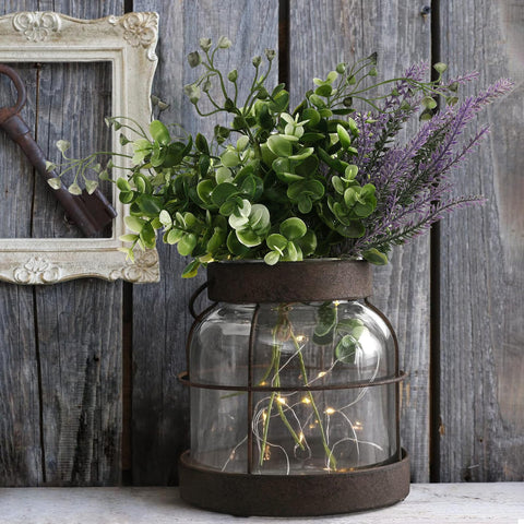 FIAHOSEY rustic lantern decor with light string creates warm ambience.