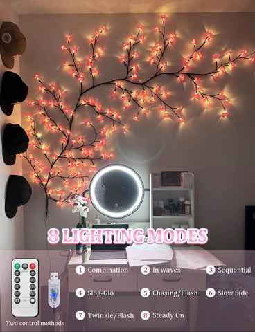 FIALAME Cherry Blossom Lights illuminate a bedroom mirror for a warm, inviting glow.