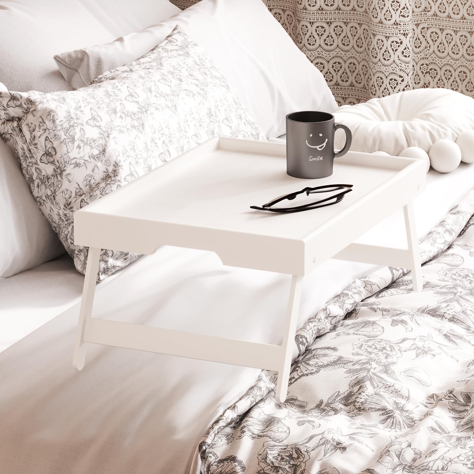 Fibogollo bamboo bed tray with folded legs for compact storage.