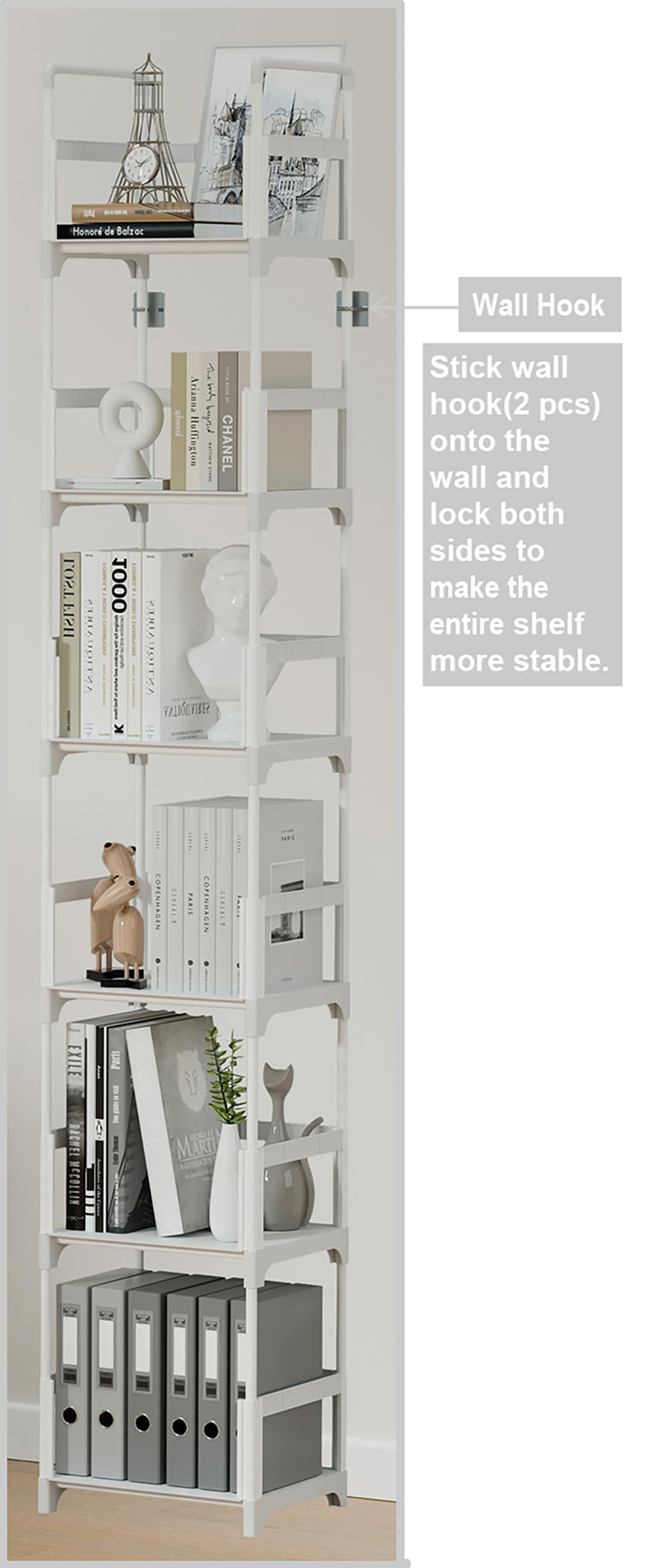 FIDUCIAL HOME white shelves with metal frame support heavy volumes.