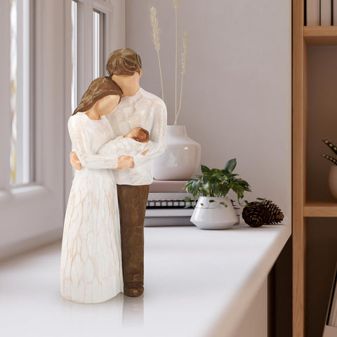 Fighting to Achieve hand-painted figurine detail captures tender family expressions.