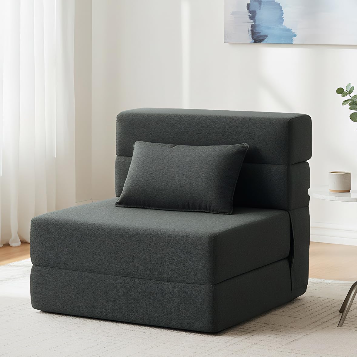 FILUXE folding sofa bed fabric closeup with removable cover for easy washing.
