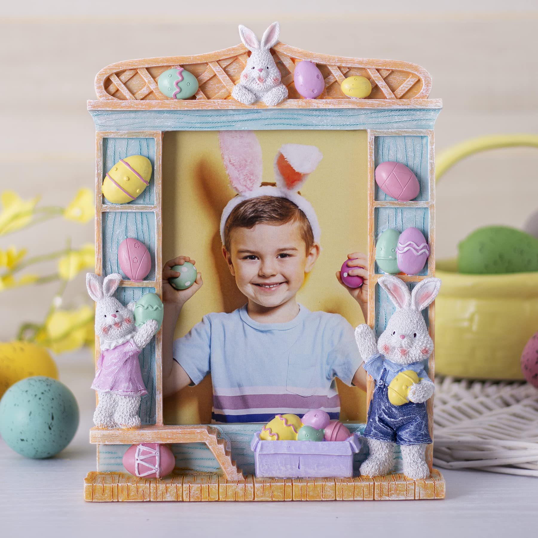 Pastel blue wood-like frame with bunnies enhances family photo display