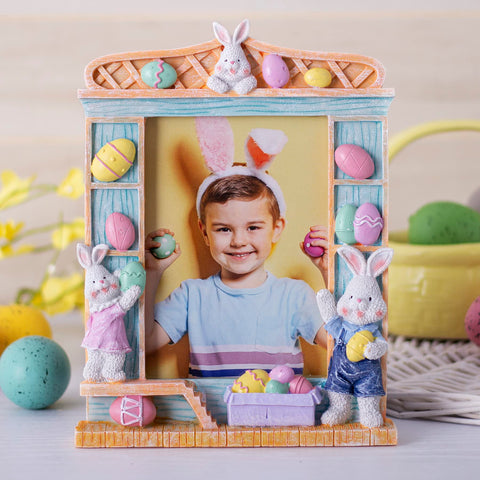 Pastel blue wood-like frame with bunnies enhances family photo display
