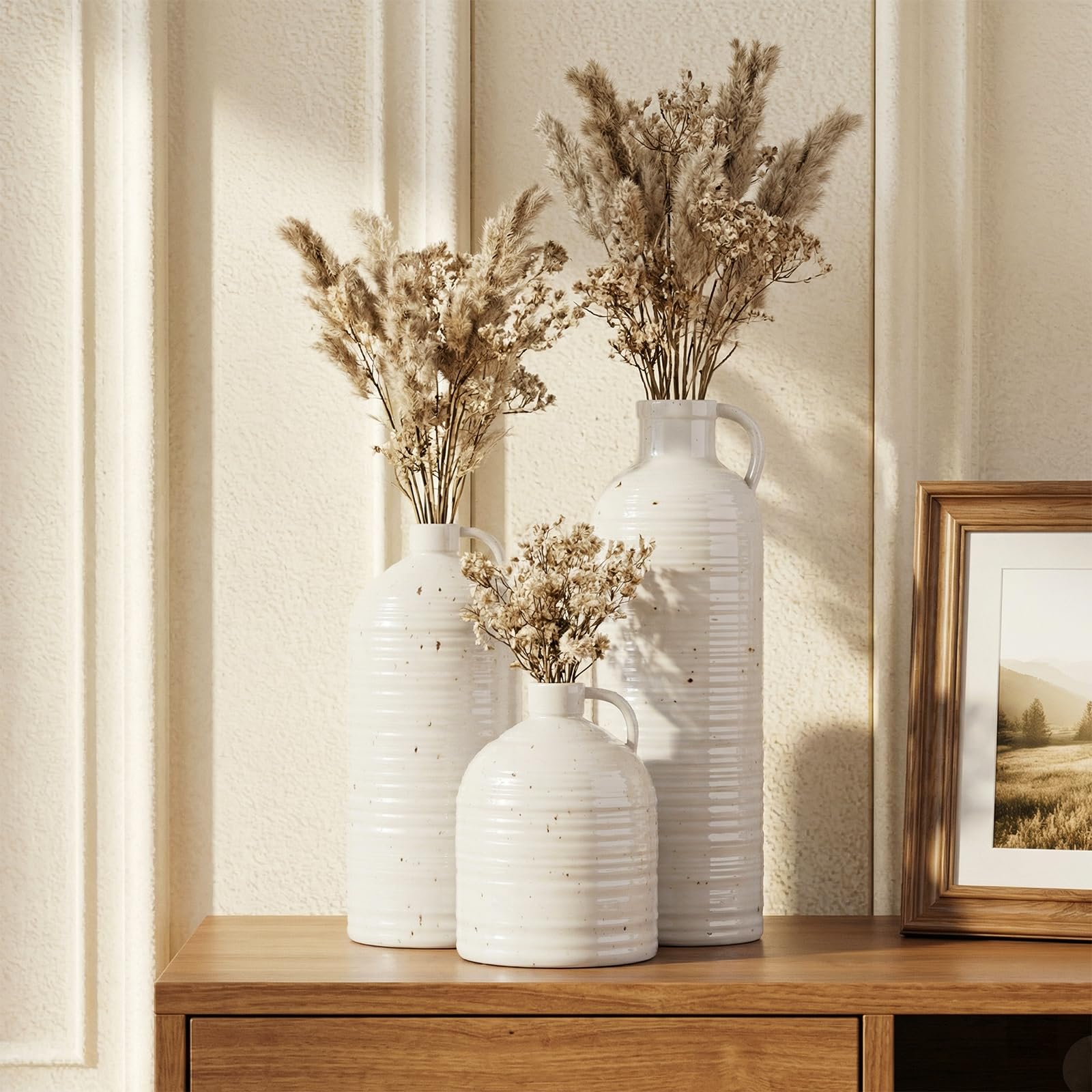 Three heights of Firehold vases offer flexible display options on shelves.